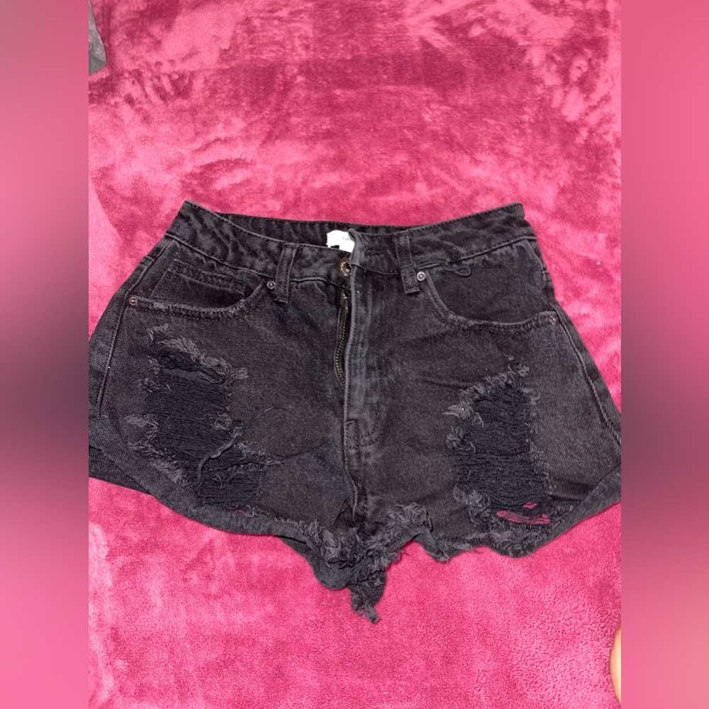 Black ripped shorts